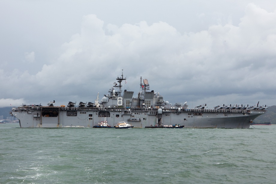 The USS Makin Island ship is seen anchored in Hong Kong waters on August 20, 2014. Makin Island (LHD-8) a Wasp-class amphibious assault ship and the second ship of the US Navy to be named Makin Island, was laid down on February 14, 2004 by the Ingalls Shipbuilding, Pascagoula, Mississippi and was christened on 19 August 2006. AFP PHOTO / ANTHONY WALLACE